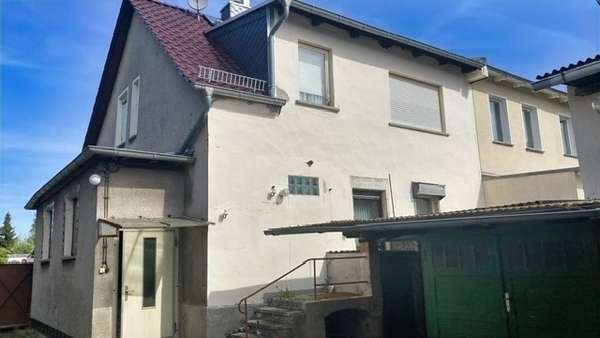 Rückansicht mit Eingangsbereic - Einfamilienhaus in 39307 Genthin mit 105m² kaufen