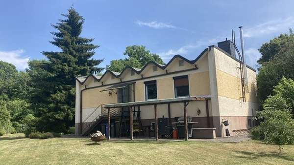Rückansicht Rückansicht - Bungalow in 39307 Hohenseeden mit 92m² kaufen