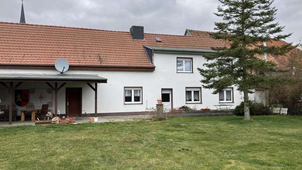 Gartenansicht - Einfamilienhaus in 39359 Calvörde mit 130m² kaufen