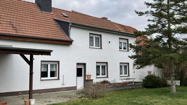 Gartenansicht - Einfamilienhaus in 39359 Calvörde mit 130m² kaufen