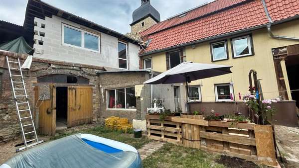 Rückansicht mit Anbau Rückansicht mit Anbau - Einfamilienhaus in 39397 Kroppenstedt mit 130m² kaufen