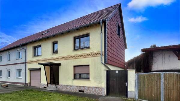 seitliche Vorderansicht seitliche Vorderansicht - Doppelhaushälfte in 39393 Ausleben mit 120m² kaufen