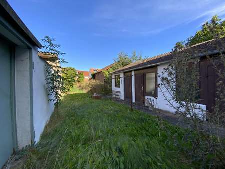 Garten mit Nebengelass Garten mit Nebengelass - Reihenmittelhaus in 99610 Sömmerda mit 120m² kaufen
