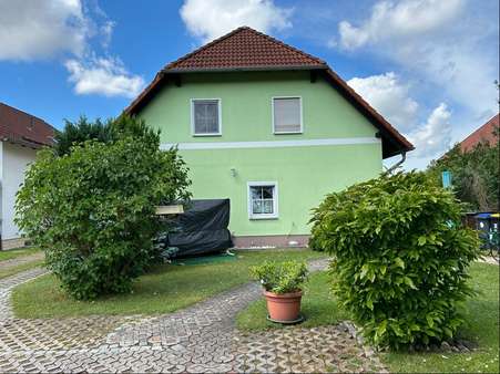 Gartenansicht - Zweifamilienhaus in 99734 Nordhausen mit 180m² kaufen