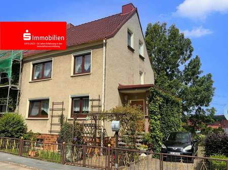 Straßenansicht - Doppelhaushälfte in 37345 Am Ohmberg mit 153m² kaufen