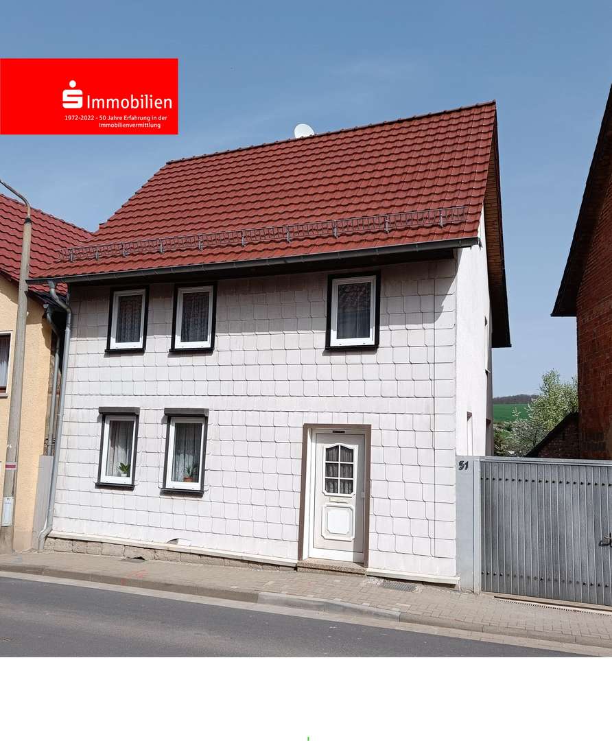 Straßenansicht - Einfamilienhaus in 37345 Sonnenstein mit 131m² kaufen