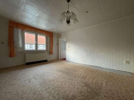 Wohnzimmer - Doppelhaushälfte in 07554 Pölzig mit 65m² kaufen