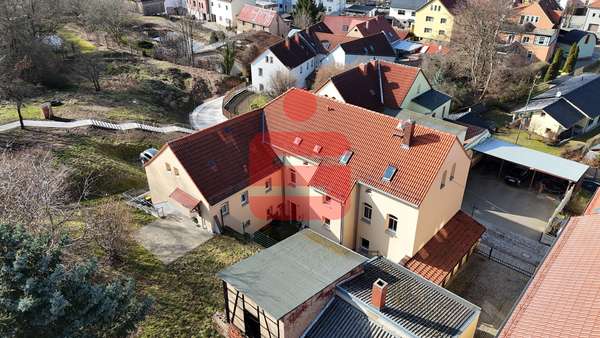 Luftaufnahme Osten - Mehrfamilienhaus in 07589 Münchenbernsdorf mit 256m² kaufen