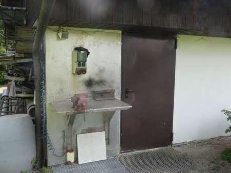 Seiteneingang Garaagen mit kleinem Außenarbeitsplatz - Doppelgarage in 07366 Rosenthal mit 87m² kaufen