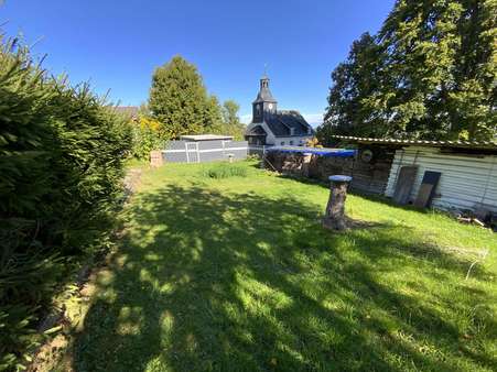 Blick In den Garten - Einfamilienhaus in 98528 Suhl mit 105m² kaufen