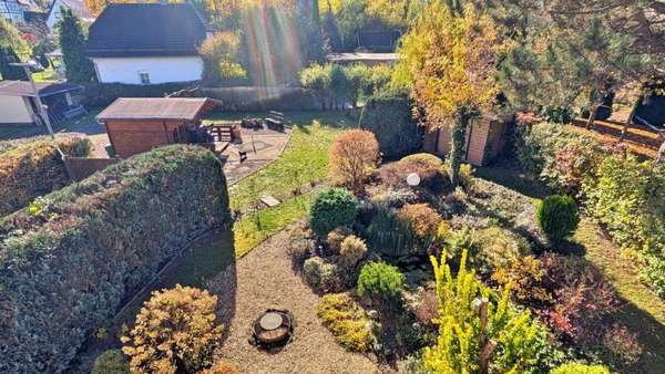 Blick in den Garten - Einfamilienhaus in 98646 Hildburghausen mit 200m² kaufen