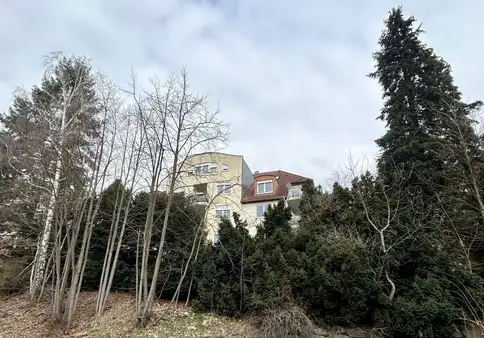 Vermietete 4-Zimmer-Maisonette-Wohnung mit Balkon, Tiefgaragenstellplatz und zusätzlichem Carport