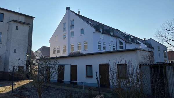 Rückseitige Giebelansicht - Etagenwohnung in 02906 Niesky mit 83m² kaufen