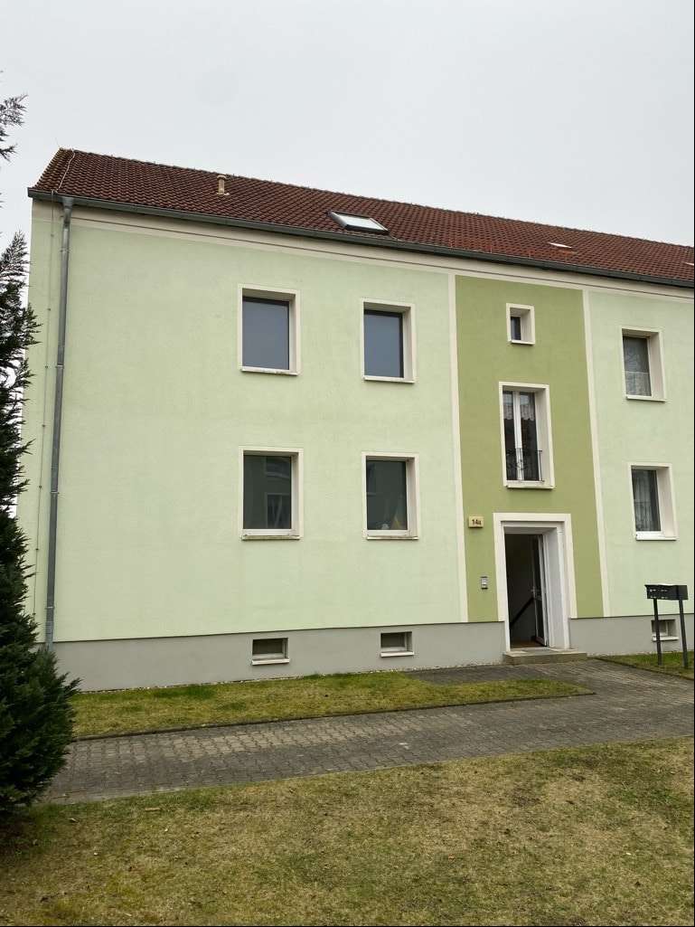 Nordansicht mit Hauseingang - Etagenwohnung in 02828 Görlitz mit 65m² kaufen