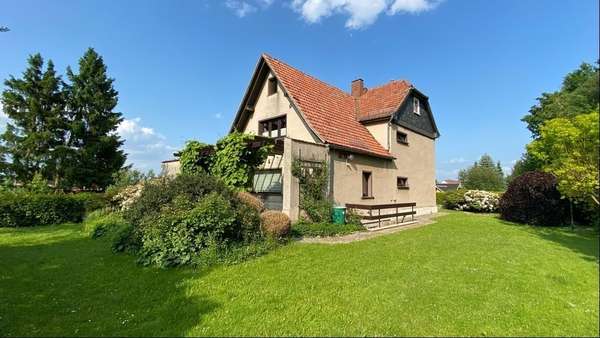 Seiten- und Rückansicht - Einfamilienhaus in 02791 Oderwitz mit 140m² kaufen