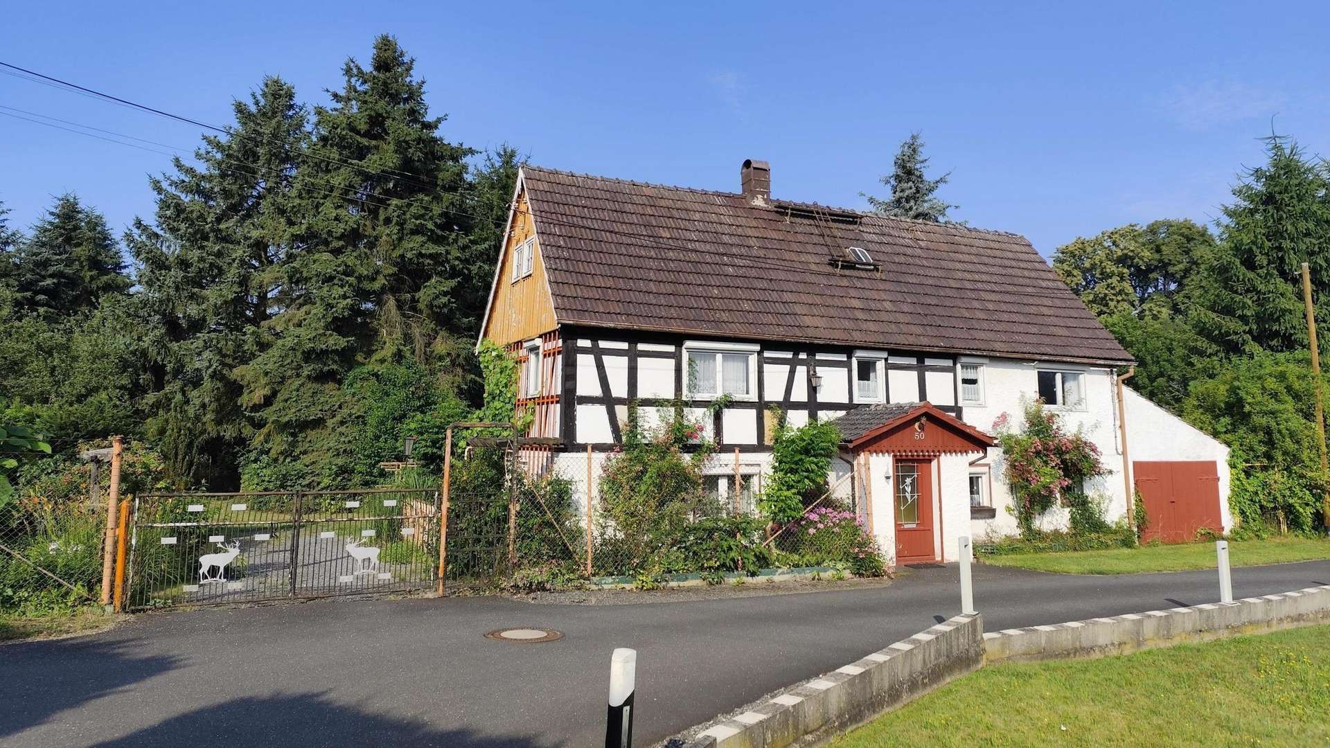 Titelbild - Einfamilienhaus in 02906 Waldhufen mit 107m² kaufen