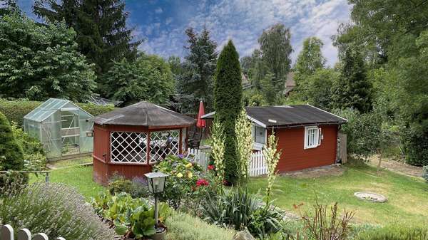 Blick auf den Garten Blick auf den Garten - Zweifamilienhaus in 02785 Olbersdorf mit 231m² kaufen