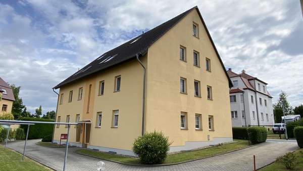 Rückansicht Objekt - Etagenwohnung in 02785 Olbersdorf mit 76m² kaufen