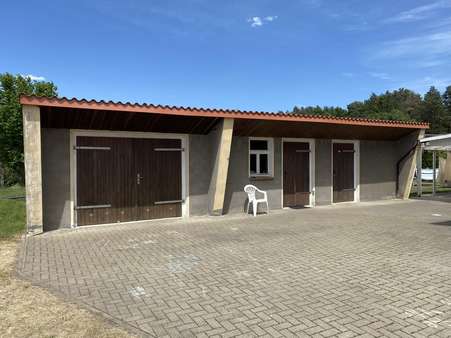 Nebengebäude mit Garage - Einfamilienhaus in 02923 Hähnichen mit 100m² kaufen