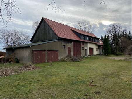 Nordwestansicht mit Garagenanbau - Einfamilienhaus in 02828 Görlitz mit 162m² kaufen