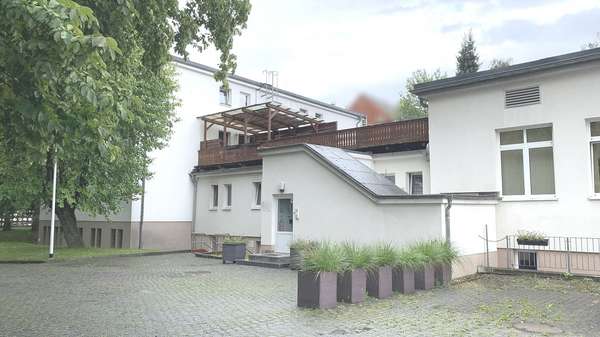 Außenansicht Verbindung MFH zu Gewerbe - Wohn- / Geschäftshaus in 04720 Döbeln mit 617m² als Kapitalanlage kaufen