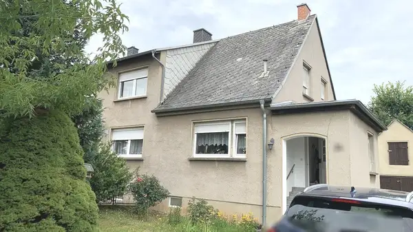 DHH mit Garage und großem Garten