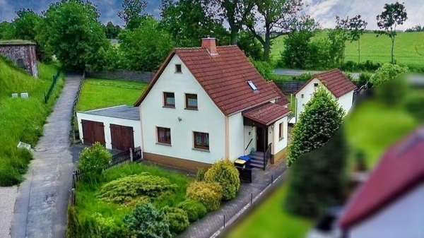 Luftbild Außenansicht - Einfamilienhaus in 09322 Penig mit 88m² kaufen