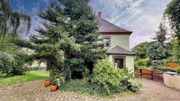 Seitenansicht  - Zweifamilienhaus in 09328 Lunzenau mit 210m² kaufen