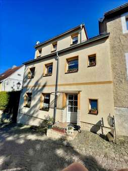 Außenansicht Straßenseite - Reihenmittelhaus in 09322 Penig mit 105m² kaufen