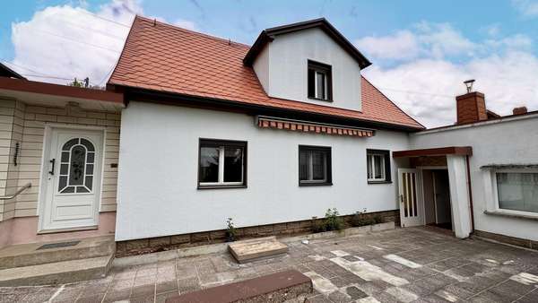 Ansicht mit Terrasse Ansicht mit Terrasse - Einfamilienhaus in 09648 Mittweida mit 77m² kaufen