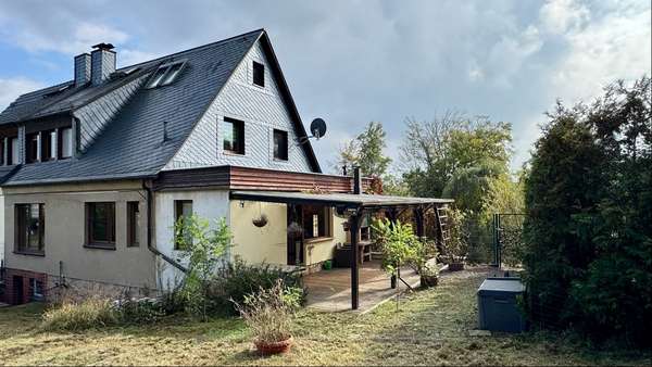 Außenansicht vom Garten aus - Doppelhaushälfte in 08056 Zwickau mit 120m² kaufen