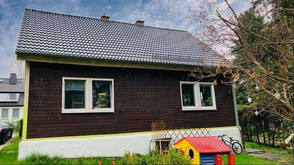 Gebäudeansicht Gartenseite - Einfamilienhaus in 08280 Aue-Bad Schlema mit 123m² kaufen
