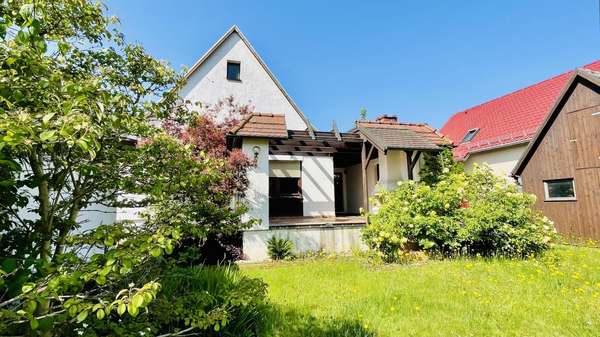 Rückansicht Rückansicht - Einfamilienhaus in 08060 Zwickau mit 120m² kaufen