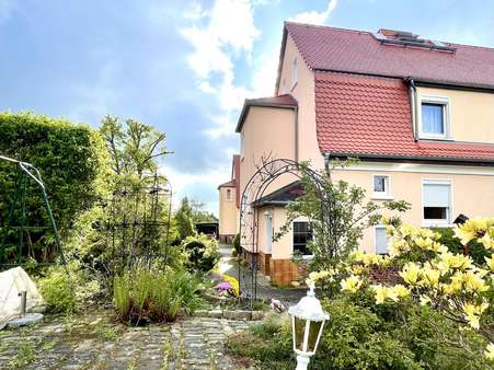 Objektansicht vom Garten - Doppelhaushälfte in 08064 Zwickau mit 68m² kaufen