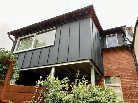 Rückseite mit Wintergarten - Mehrfamilienhaus in 08209 Auerbach mit 116m² kaufen