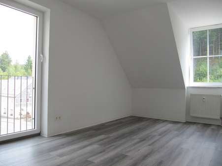 Schlafzimmer Bild 1 - Dachgeschosswohnung in 08262 Muldenhammer mit 64m² mieten