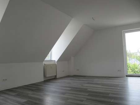 Wohnzimmer Bild 2 - Dachgeschosswohnung in 08262 Muldenhammer mit 64m² mieten