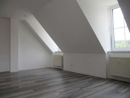 Wohnzimmer Bild 3 - Dachgeschosswohnung in 08262 Muldenhammer mit 64m² mieten