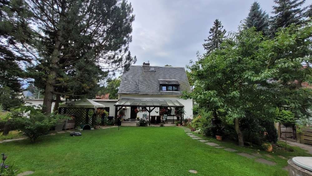 hintere Ansicht mit Terrasse hintere Ansicht mit Terrasse - Einfamilienhaus in 08523 Plauen mit 150m² kaufen