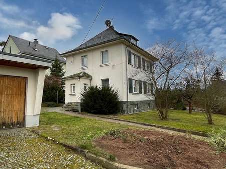 seitliche Ansicht Wohnhaus - Einfamilienhaus in 08538 Weischlitz mit 100m² kaufen