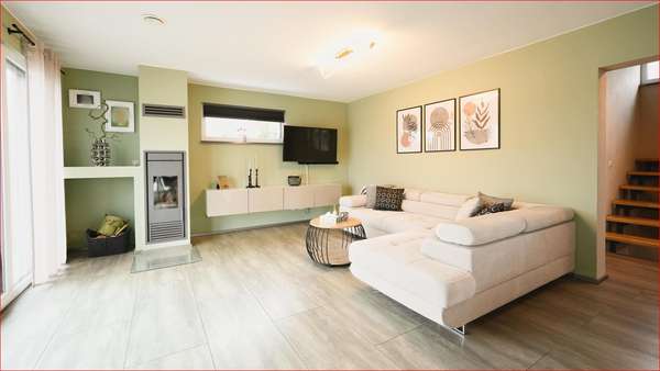 Wohnzimmer Wohnzimmer - Zweifamilienhaus in 88416 Ochsenhausen mit 177m² kaufen