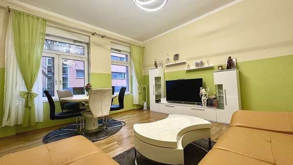 Wohnzimmer Bild 3 Wohnzimmer Bild 3 - Erdgeschosswohnung in 70193 Stuttgart mit 62m² kaufen