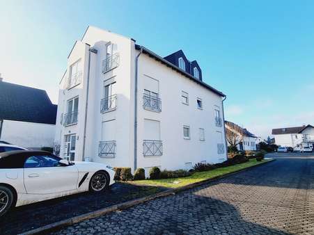 Hausunterseite Hausunterseite - Dachgeschosswohnung in 56203 Höhr-Grenzhausen mit 50m² kaufen