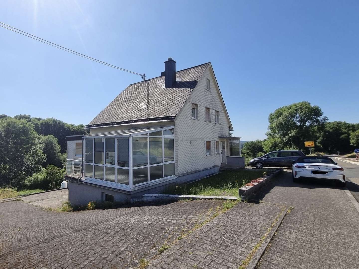 Seitenansicht - Einfamilienhaus in 56472 Dreisbach mit 149m² kaufen