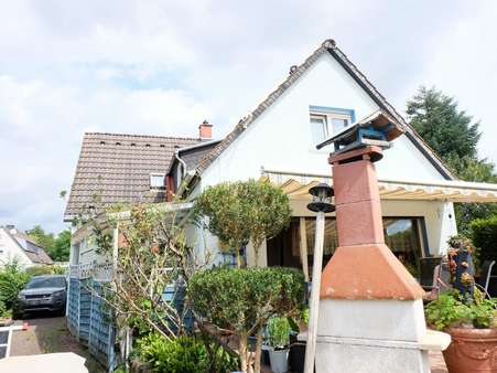 Gartenansicht - Einfamilienhaus in 60439 Frankfurt mit 125m² kaufen