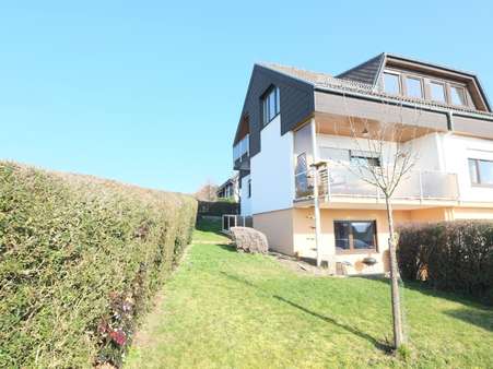 Gartenansicht - Mehrfamilienhaus in 61250 Usingen mit 220m² kaufen