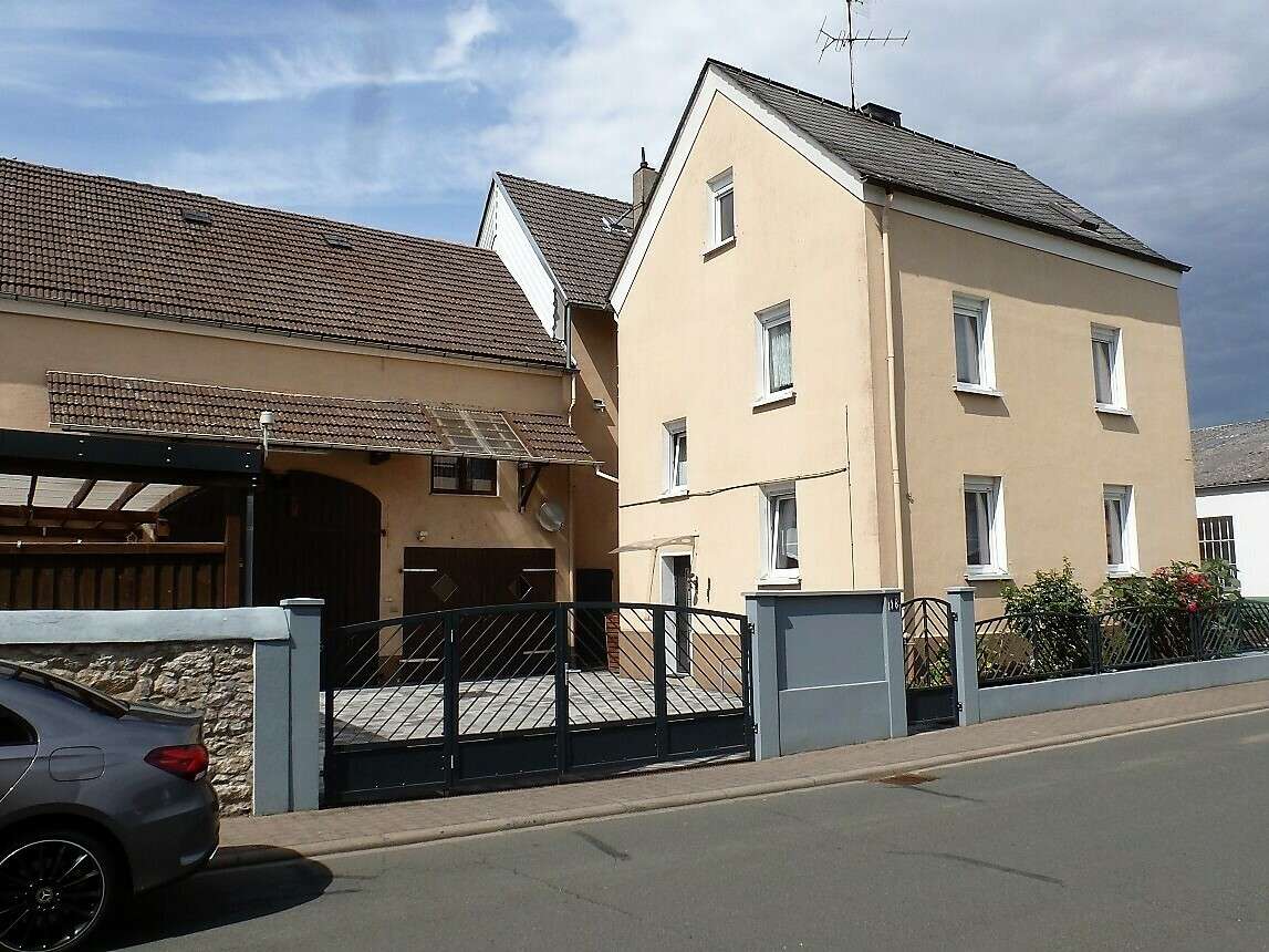Ansicht - Einfamilienhaus in 65558 Lohrheim mit 216m² kaufen