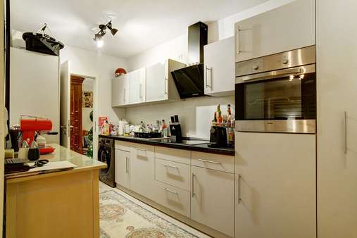 Küche mit Waschmaschine - Etagenwohnung in 81549 München mit 62m² kaufen