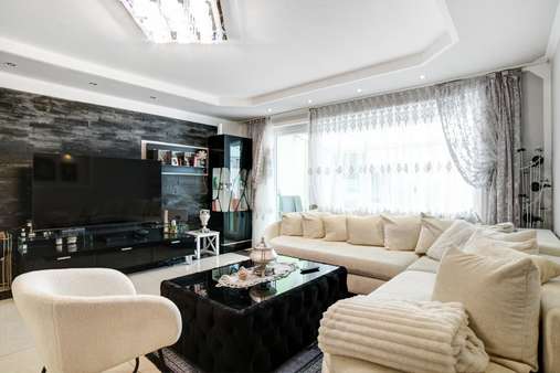 Wohnzimmer Bild 2 - Doppelhaushälfte in 81929 München mit 143m² kaufen