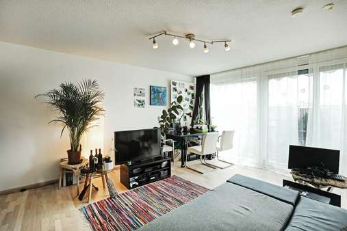 Wohnzimmer - Etagenwohnung in 85716 Unterschleißheim mit 50m² kaufen